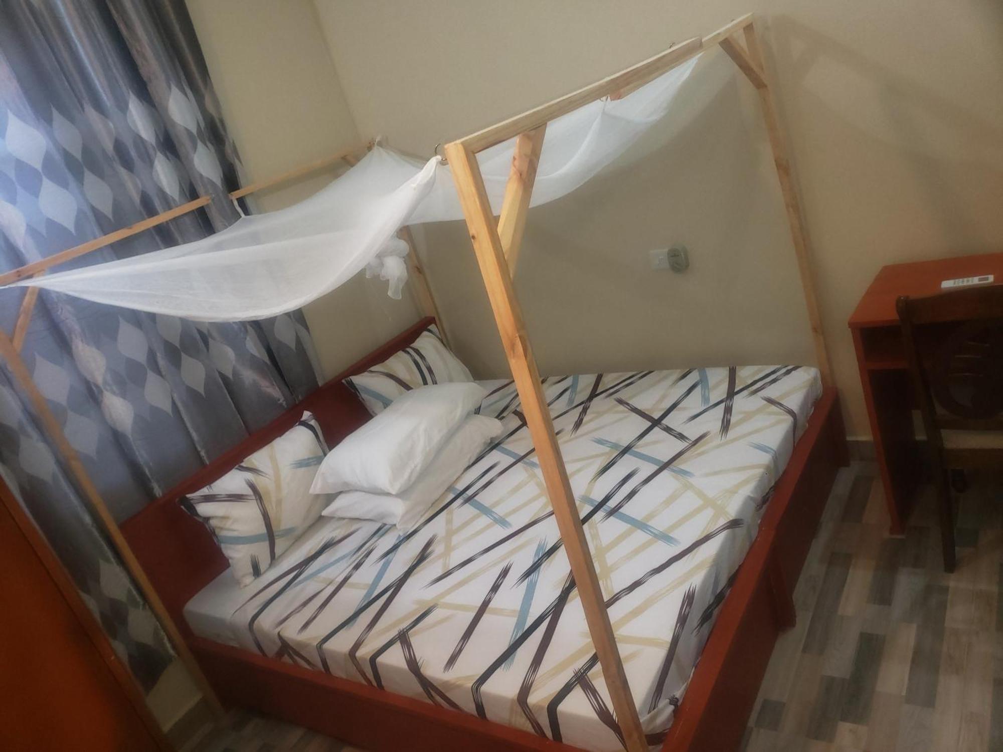L&J Modern Backpackers Bnb Дар-эс-Саламе Экстерьер фото
